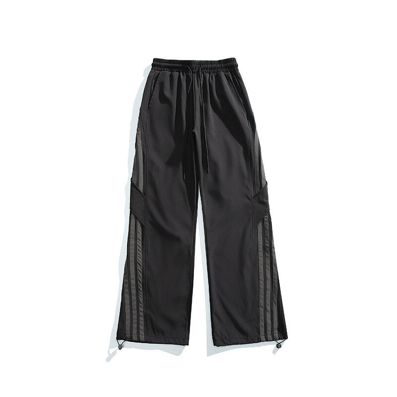 Pantaloni “Side Line Era” larghi con righe laterali