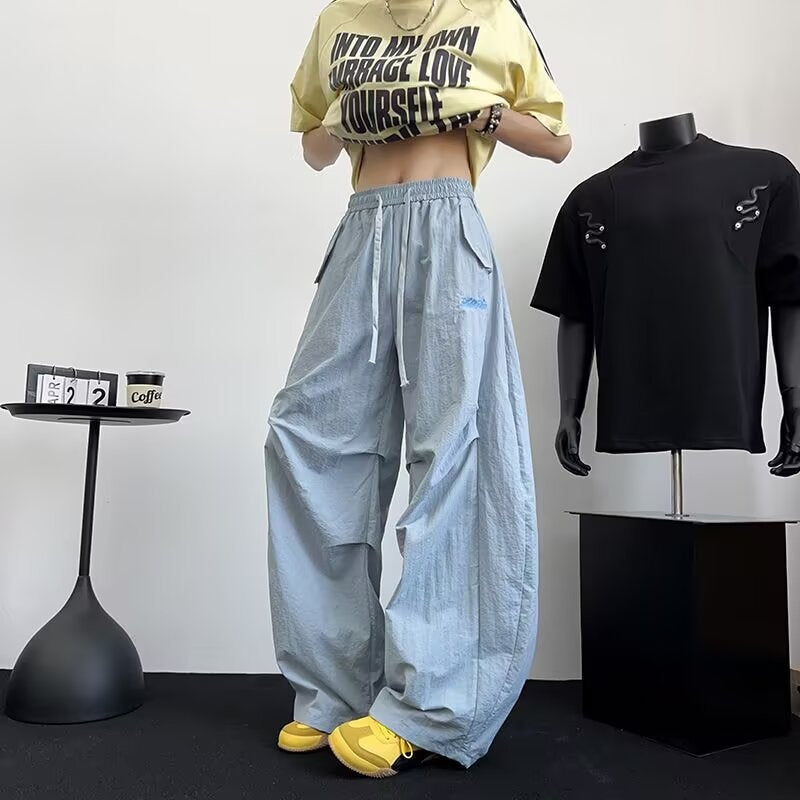 Pantaloni “Flow Rider” sportivi larghi ricamati