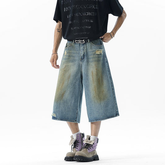 Bermuda denim vintage con strappi e gamba larga