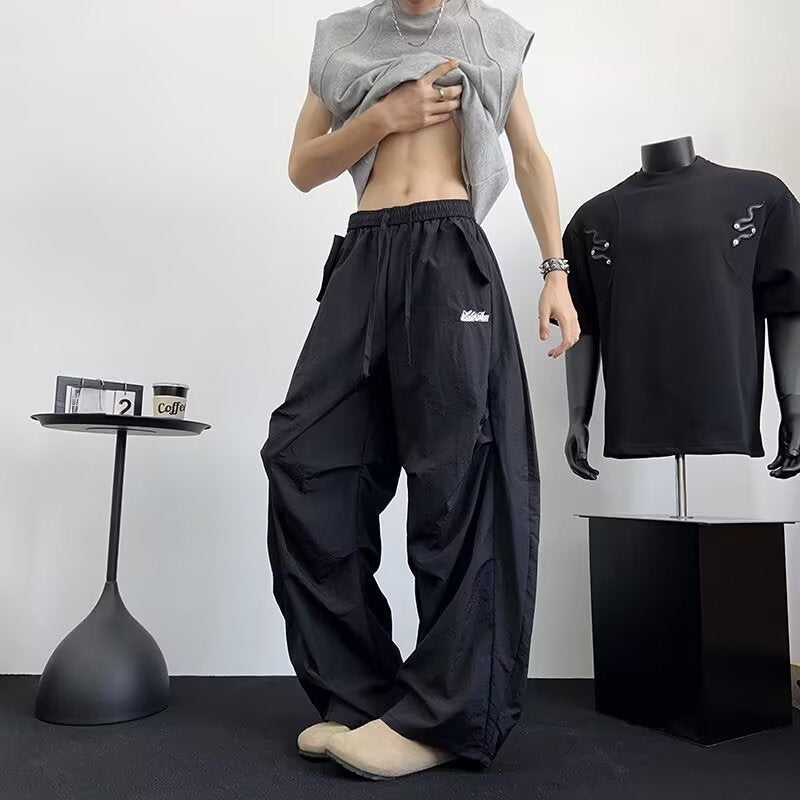 Pantaloni “Flow Rider” sportivi larghi ricamati