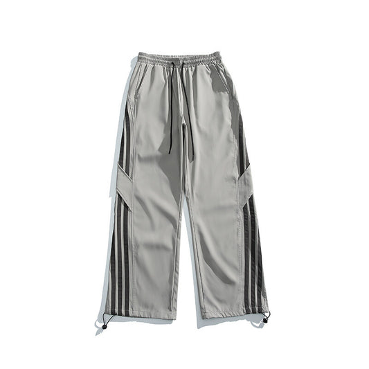 Pantaloni “Side Line Era” larghi con righe laterali