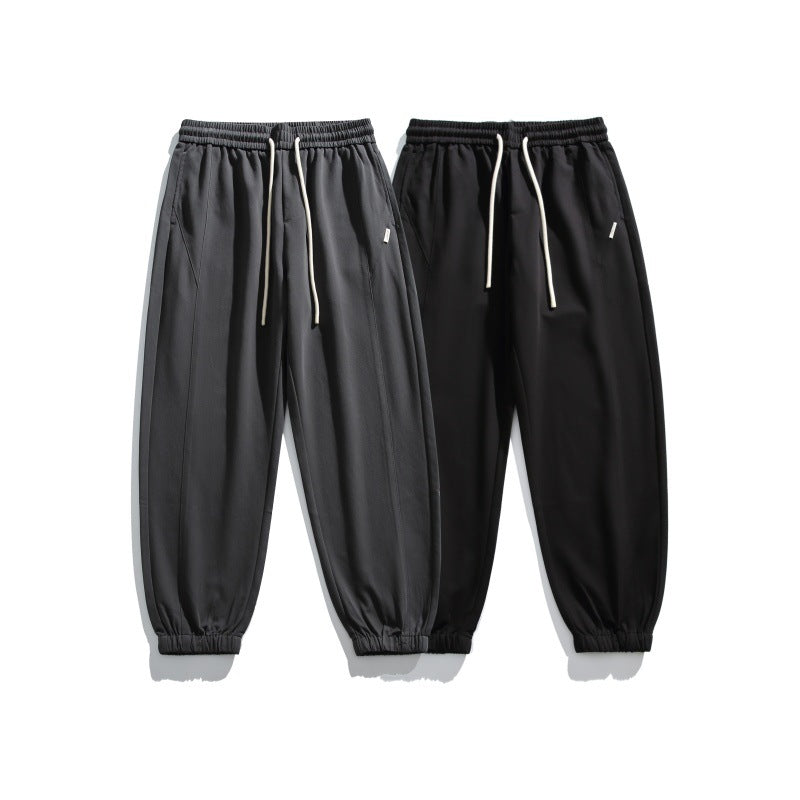 Pantaloni “Zen Drift” larghi antirughe con coulisse