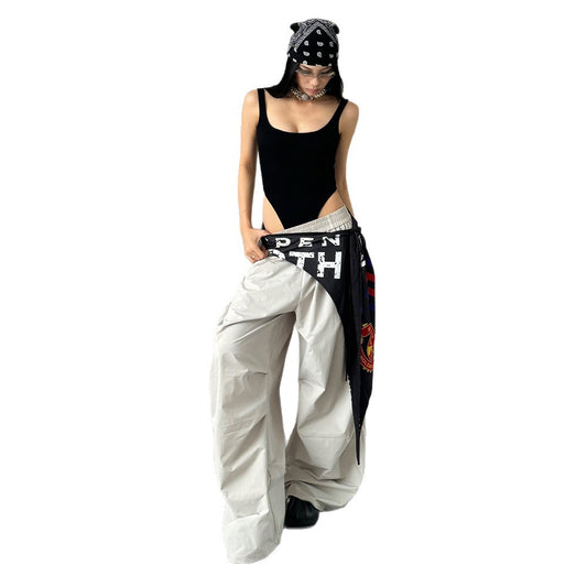 Pantaloni “Flow Zone” sportivi a gamba larga ad asciugatura rapida